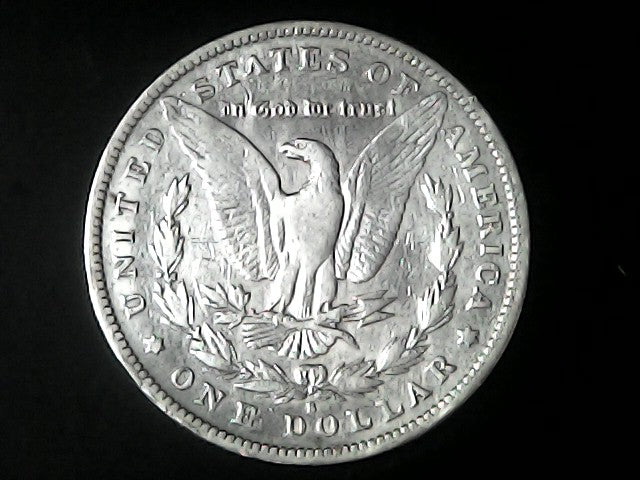 Silver Dollar with an eagle design and 'S' inscription on a black background