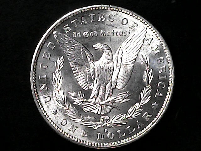 Silver Dollar with an eagle design, 'In God We Trust' and with "S" inscription on a black background