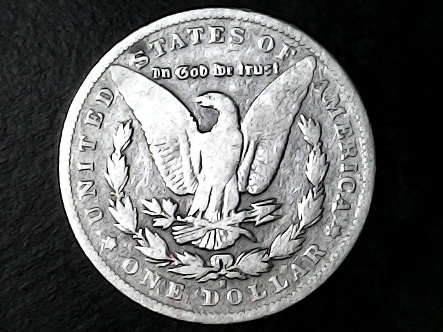 Silver Dollar with an eagle design, 'In God We Trust' and with "S" inscription on a black background