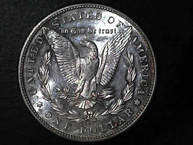Silver Dollar with an eagle design, 'In God We Trust' and with "S" inscription on a black background