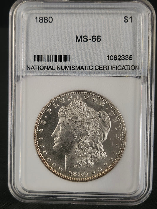 1880-P silver dollar coin NNC (MS-66) in a protective holder with grading information.