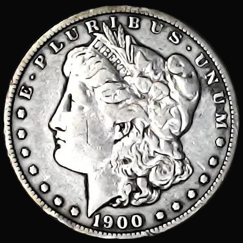 Silver Morgan Dollar Left-facing profile of Liberty wearing a Phrygian cap, with 'LIBERTY', "E PLURIBUS UNUM" and '1900' inscriptions
