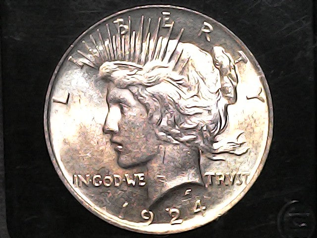 1924 Silver Peace dollar  with 'Liberty' and 'In God We Trust' inscriptions