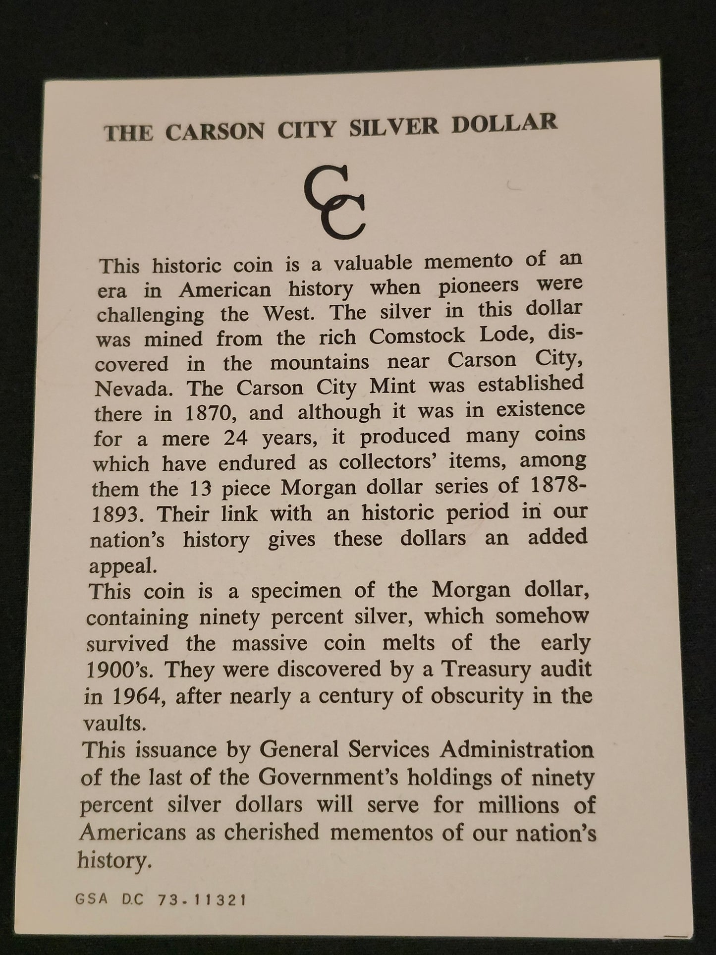 Card with text about the Carson City Silver Dollar on a black background