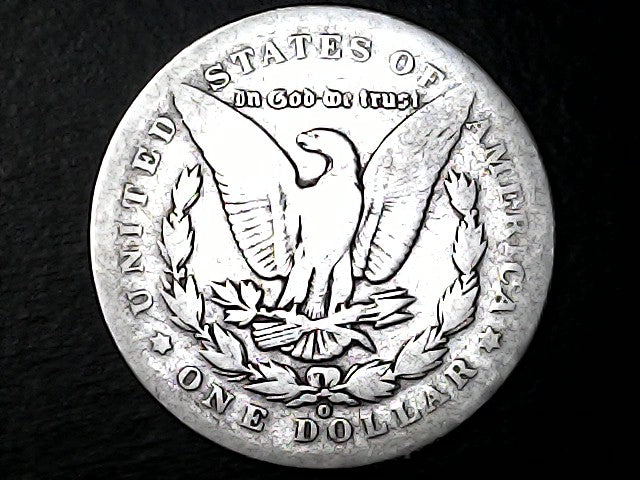 Silver dollar coin with an eagle emblem  and 'O' inscriptions on a black background