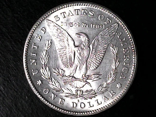 Silver Dollar with an eagle design, 'In God We Trust' and with "S" inscription on a black background