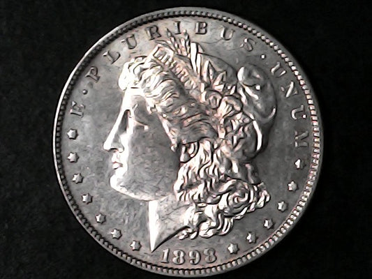 Silver Morgan Dollar '1898' with a dark background