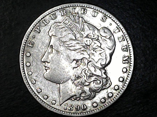 Silver Morgan Dollar Left-facing profile of Liberty wearing a Phrygian cap, with 'LIBERTY', "E PLURIBUS UNUM" and '1890' inscriptions on a black background with case