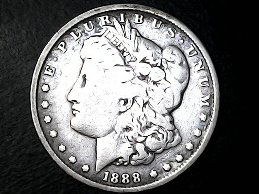 Silver Morgan Dollar Left-facing profile of Liberty wearing a Phrygian cap, with 'LIBERTY', "E PLURIBUS UNUM" and '1888' inscriptions on a black background with case