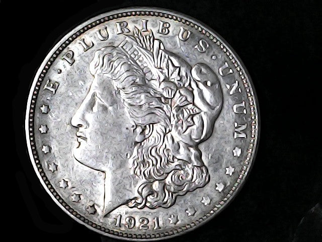Silver Morgan Dollar Left-facing profile of Liberty wearing a Phrygian cap, with 'LIBERTY', "E PLURIBUS UNUM" and '1921' inscriptions on a black background with case
