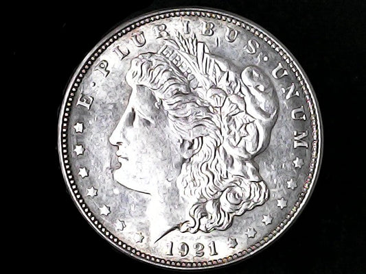 Silver Morgan Dollar Left-facing profile of Liberty wearing a Phrygian cap, with 'LIBERTY', "E PLURIBUS UNUM" and '1921' inscriptions on a black background with case