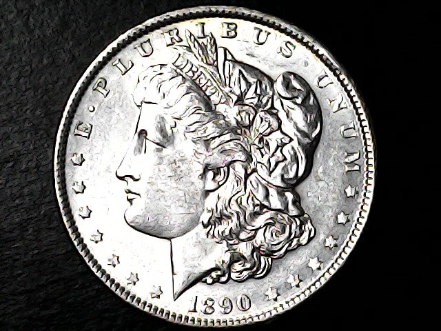 Silver Morgan Dollar with 'E Pluribus Unum', 'Liberty'  and '1890' inscriptions on a black background with case