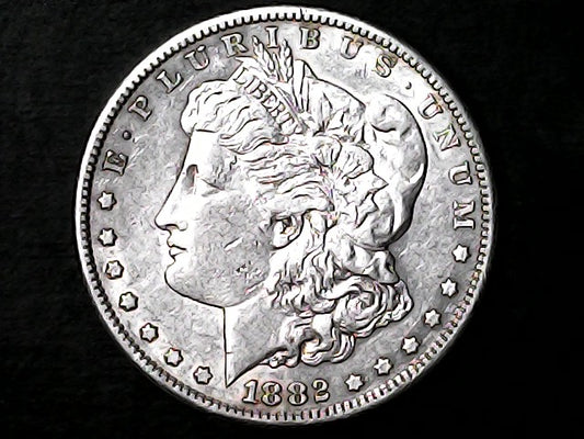 Silver Morgan Dollar Left-facing profile of Liberty wearing a Phrygian cap, with 'LIBERTY', "E PLURIBUS UNUM" and '1882' inscriptions on a black background with case