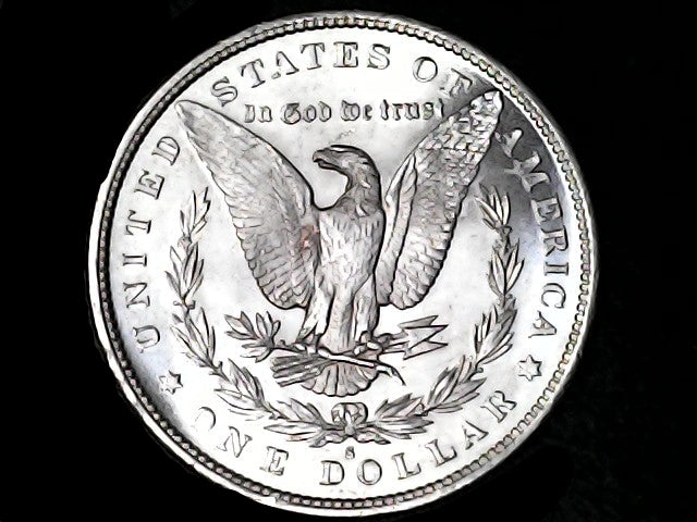 Silver Dollar with an eagle design, 'In God We Trust' and with "S" inscription on a black background