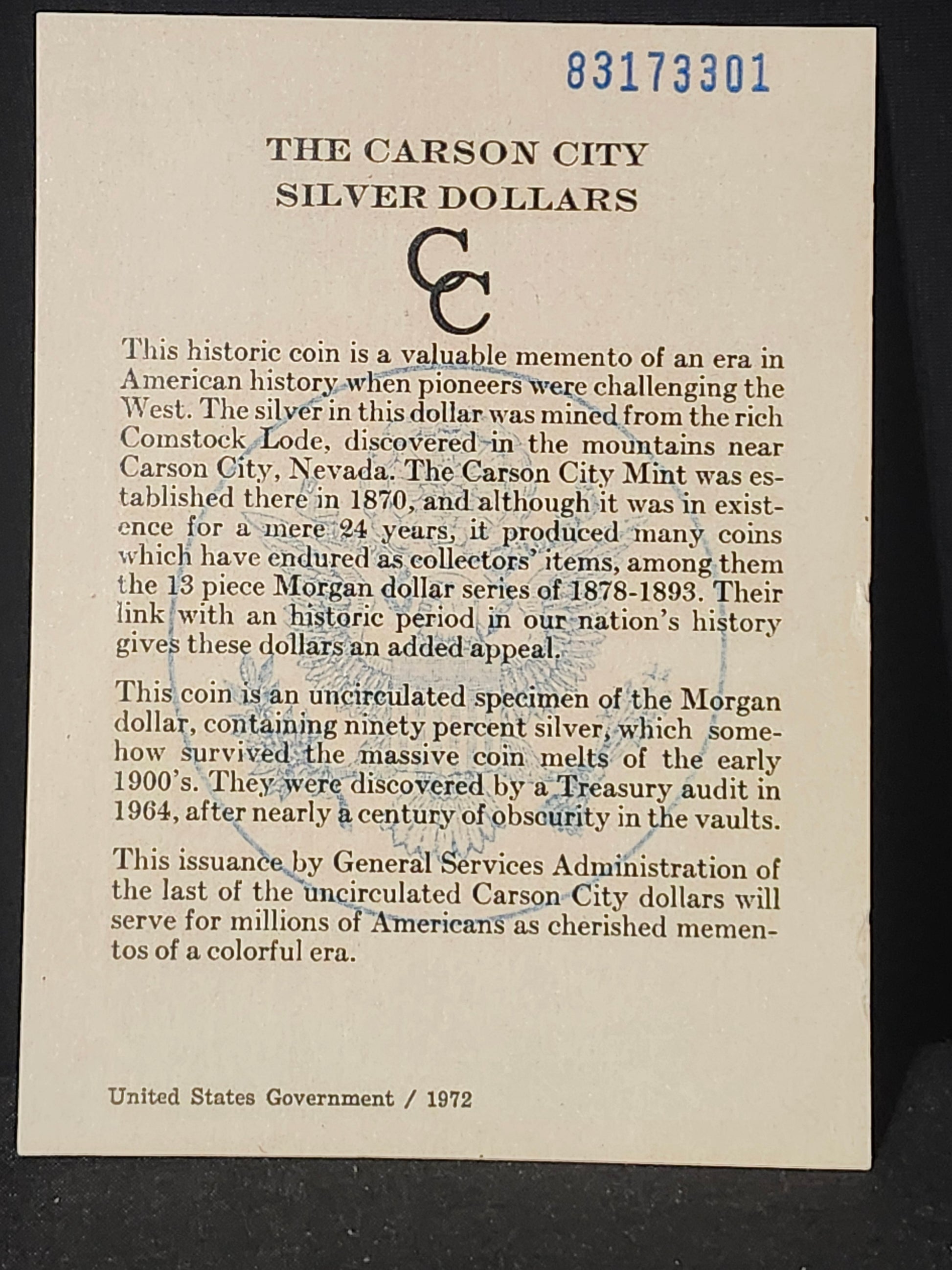 Card with text about Carson City Silver Dollars on a black background