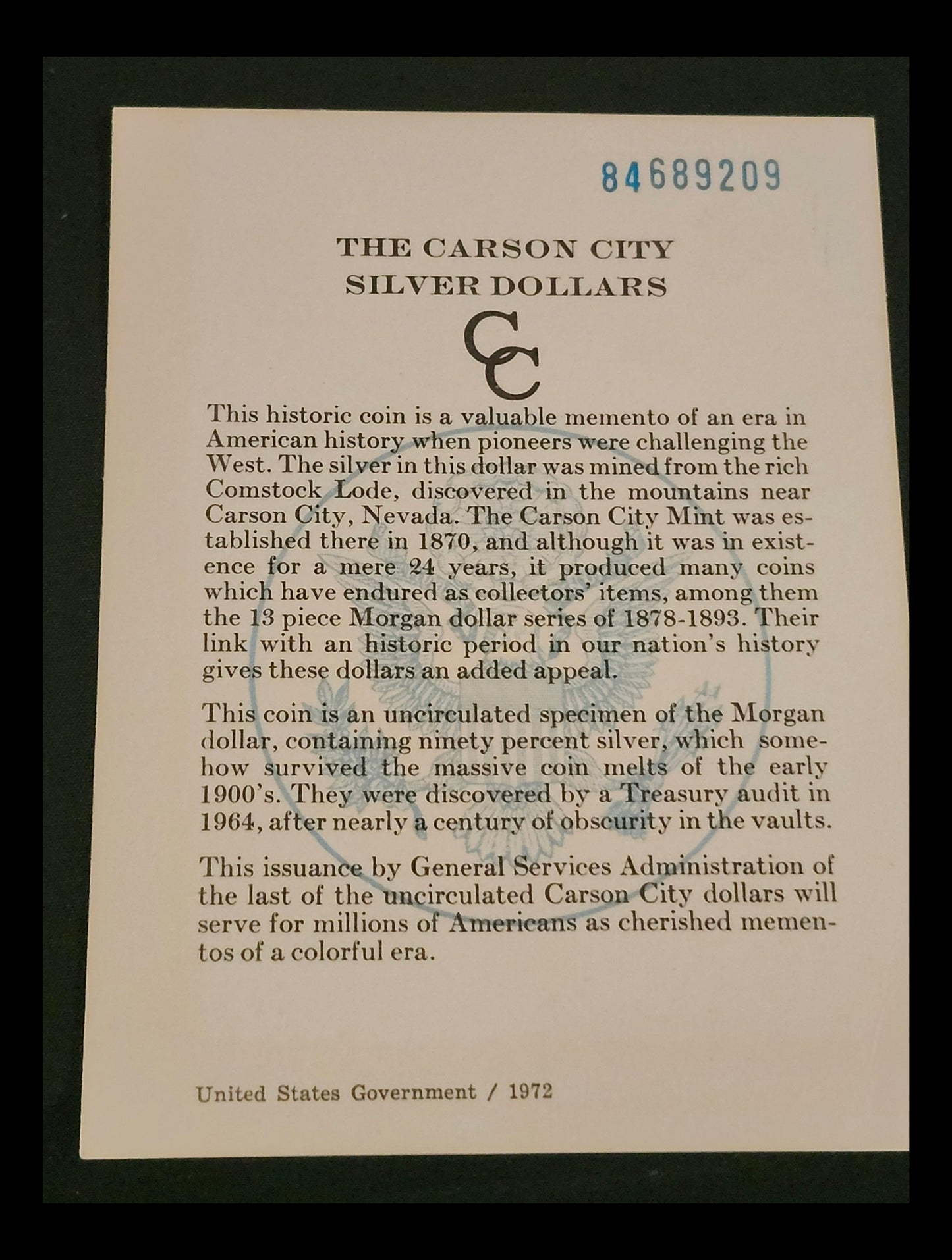 Informational card about Carson City silver dollars with text and a logo on a black background