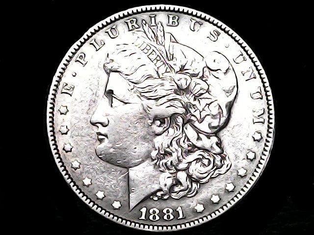Silver Morgan Dollar Left-facing profile of Liberty wearing a Phrygian cap, with 'LIBERTY', "E PLURIBUS UNUM" and '1881' inscriptions on a black background with case