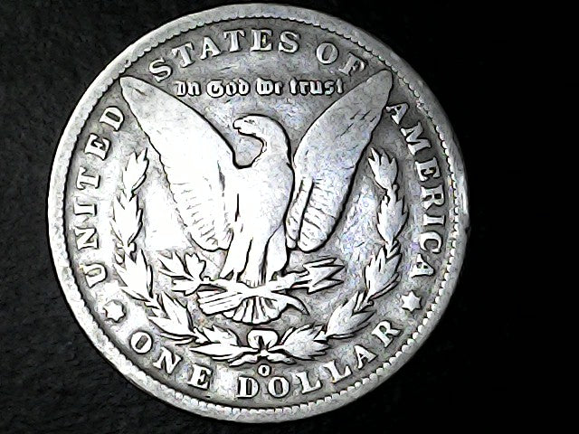 Silver Dollar with an eagle design with "O" inscription on a black background