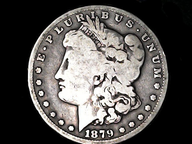 Silver Morgan dollar coin with 'E Pluribus Unum' and '1879' inscription on a dark background