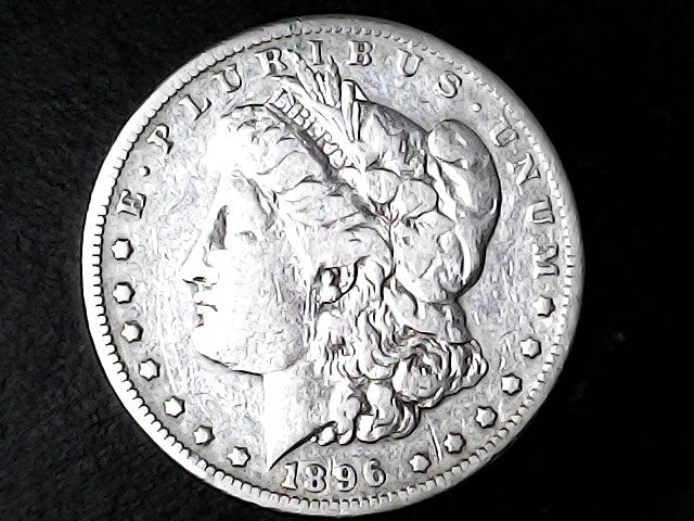 Silver Morgan Dollar Left-facing profile of Liberty wearing a Phrygian cap, with 'LIBERTY', "E PLURIBUS UNUM" and '1896' inscriptions on a black background with case
