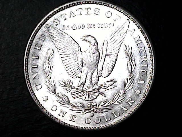 Silver dollar coin with an eagle designand 'S' inscription on a black background
