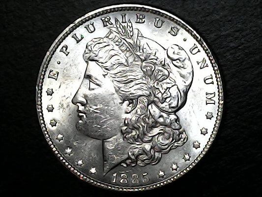 1885 Morgan Dollar with Liberty on a black background