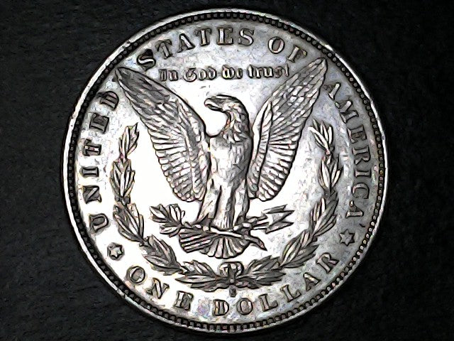 Silver Dollar with an eagle design, 'In God We Trust' and with "S" inscription on a black background