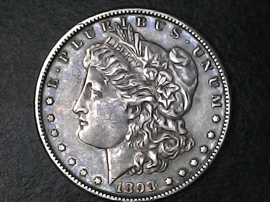 Silver Morgan Dollar Left-facing profile of Liberty wearing a Phrygian cap, with 'LIBERTY', "E PLURIBUS UNUM" and '1898' inscriptions on a black background with case