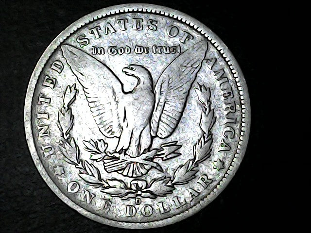 Silver Dollar with an eagle design with "O" inscription on a black background