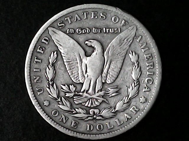 Silver Dollar with an eagle design, 'In God We Trust' and with "S" inscription on a black background