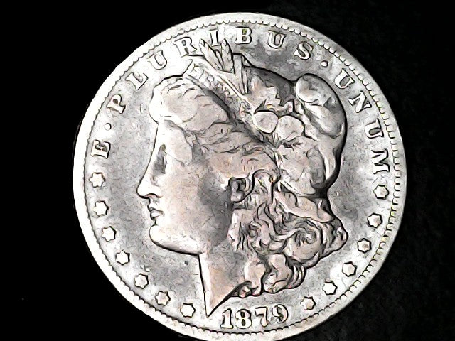Silver Morgan Dollar Left-facing profile of Liberty wearing a Phrygian cap, with 'LIBERTY', "E PLURIBUS UNUM" and '1879' inscriptions on a black background with case