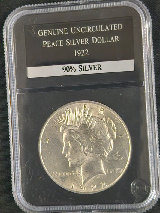 Genuine Uncirculated '1922' Peace silver dollar in  protective clear case