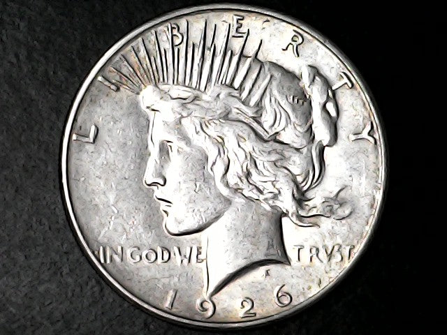 1926 silver Peace dollar with 'Liberty' and 'In God We Trust' inscriptions