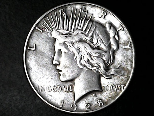 1928 Peace dollar with inscription 'LIBERTY' and 'In God We Trvst'