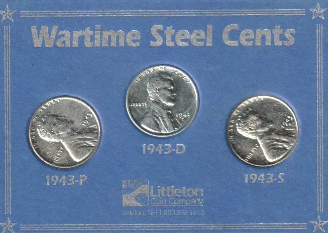 Collection of wartime steel cents in a display case
