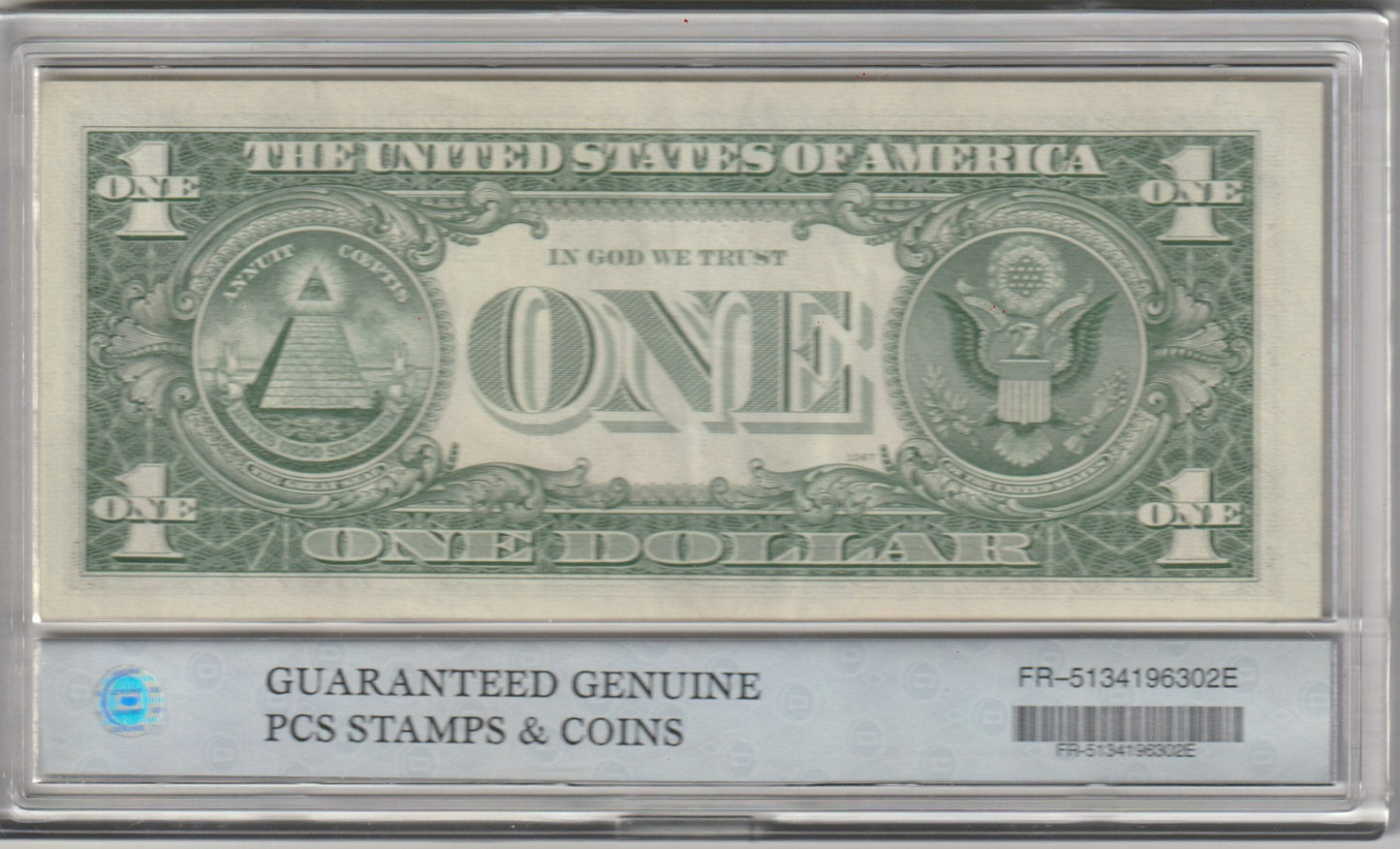 One dollar bill in a holder with 'Guaranteed Genuine' label  FR-5134196302E