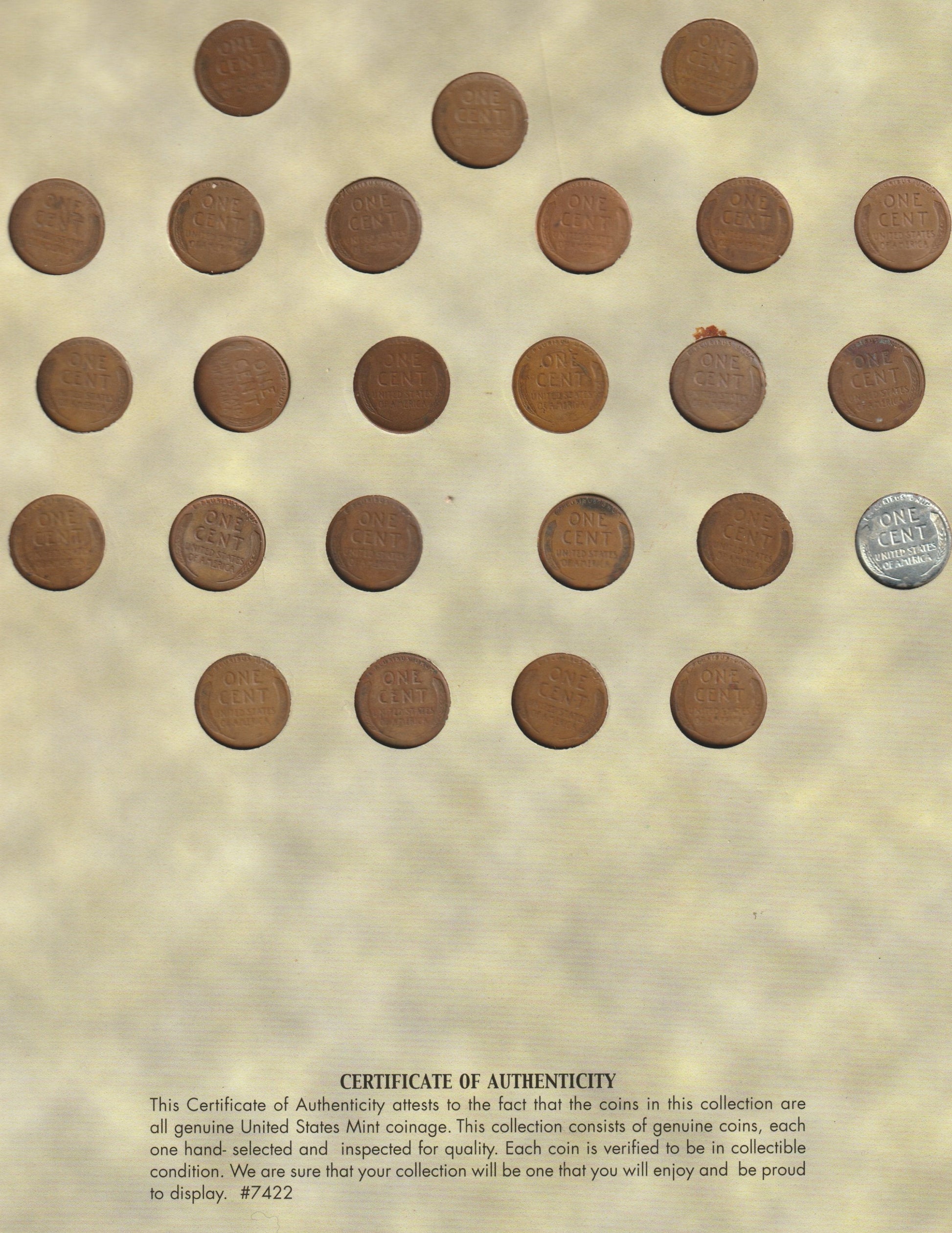 Collection of wheat coins in a holder with a certificate of authenticity 
