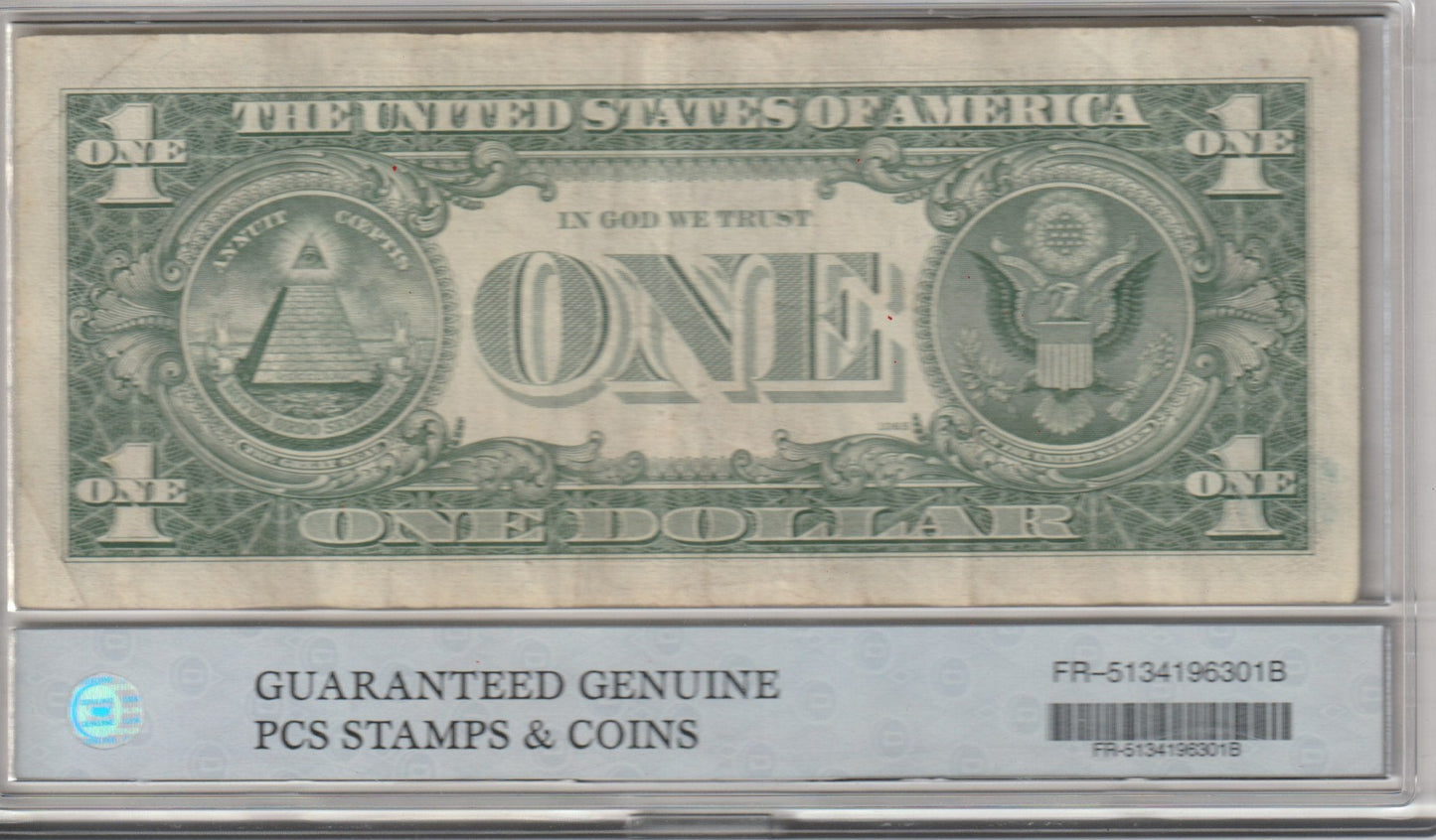 One dollar bill in a holder with 'Guaranteed Genuine' label  FR-5134196301G