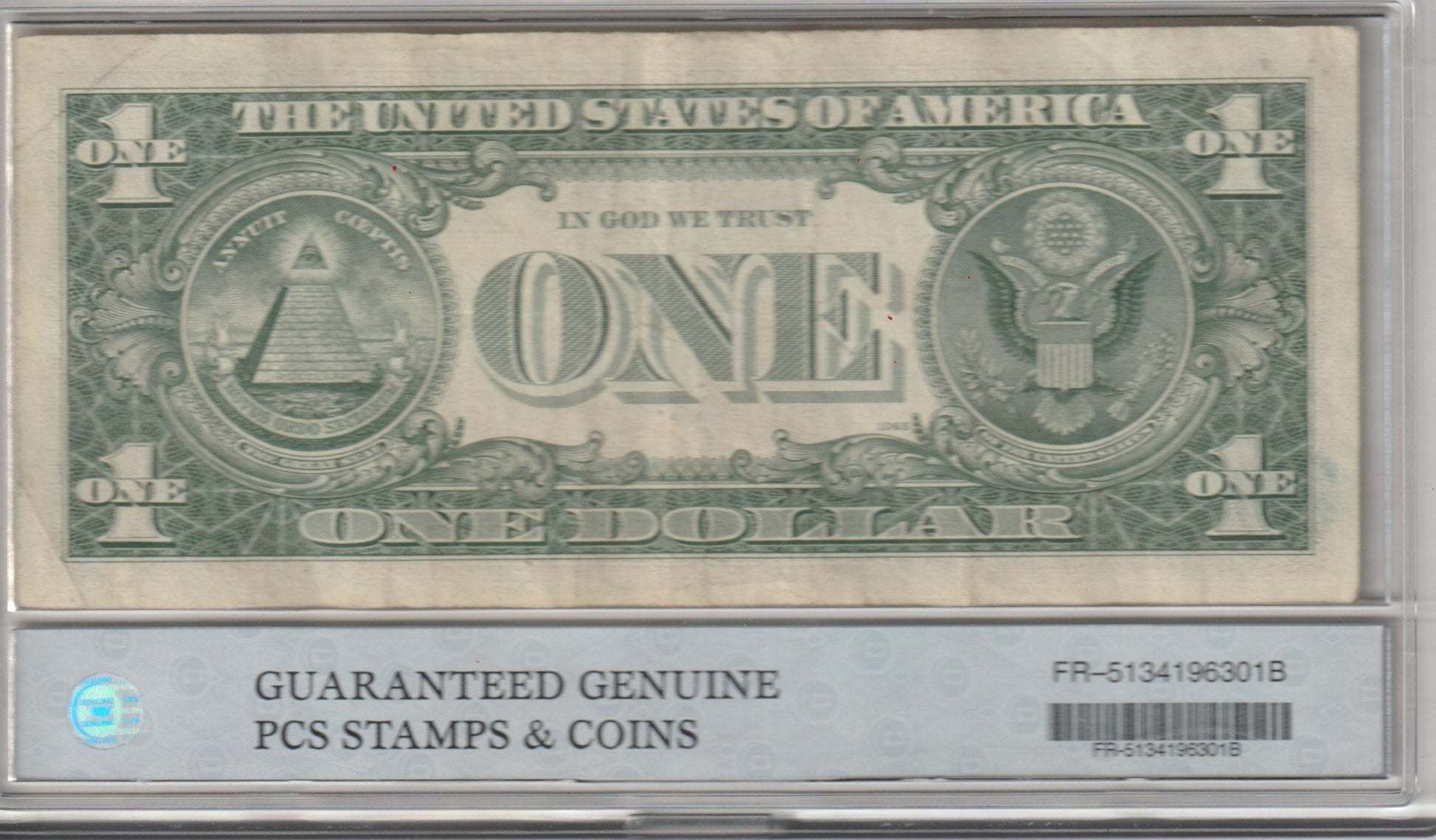 One dollar bill in a holder with 'Guaranteed Genuine' label  FR-5134196301G